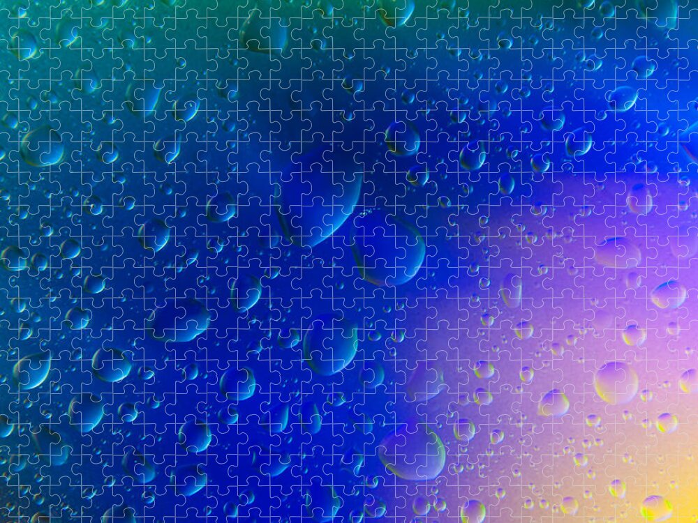 Abstract Jigsaw Puzzle featuring the photograph Colorfull Water drop background abstract by Michalakis Ppalis