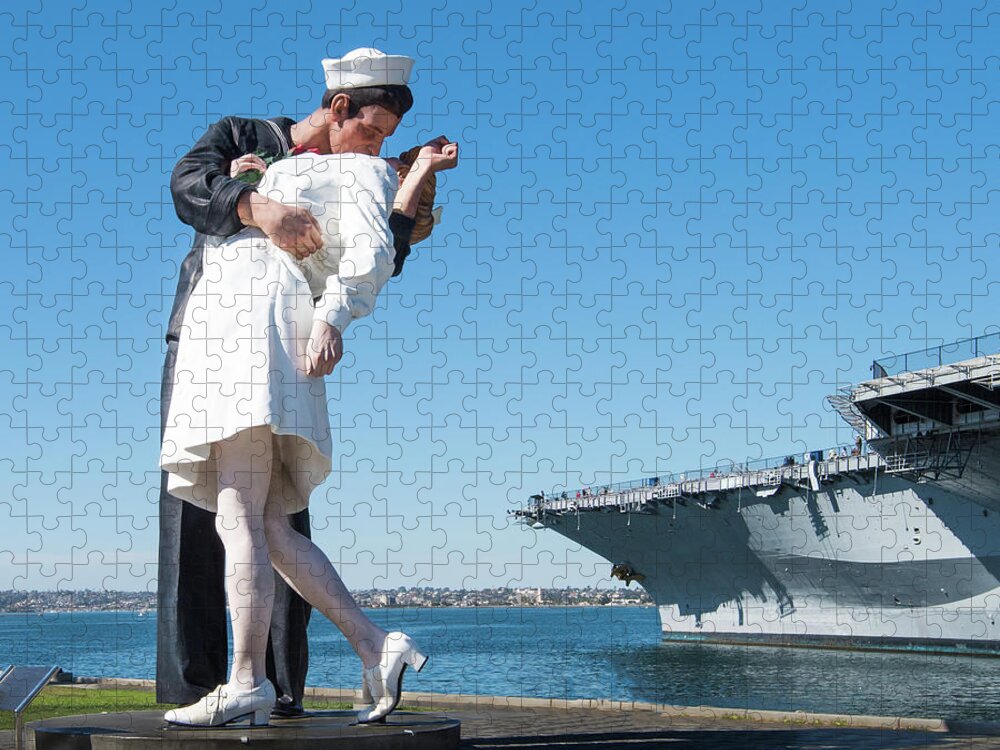 Embracing Peace Sculpture Jigsaw Puzzle featuring the photograph Embracing Peace Sculpture and USS Midway Aircraft Carrier by David Levin