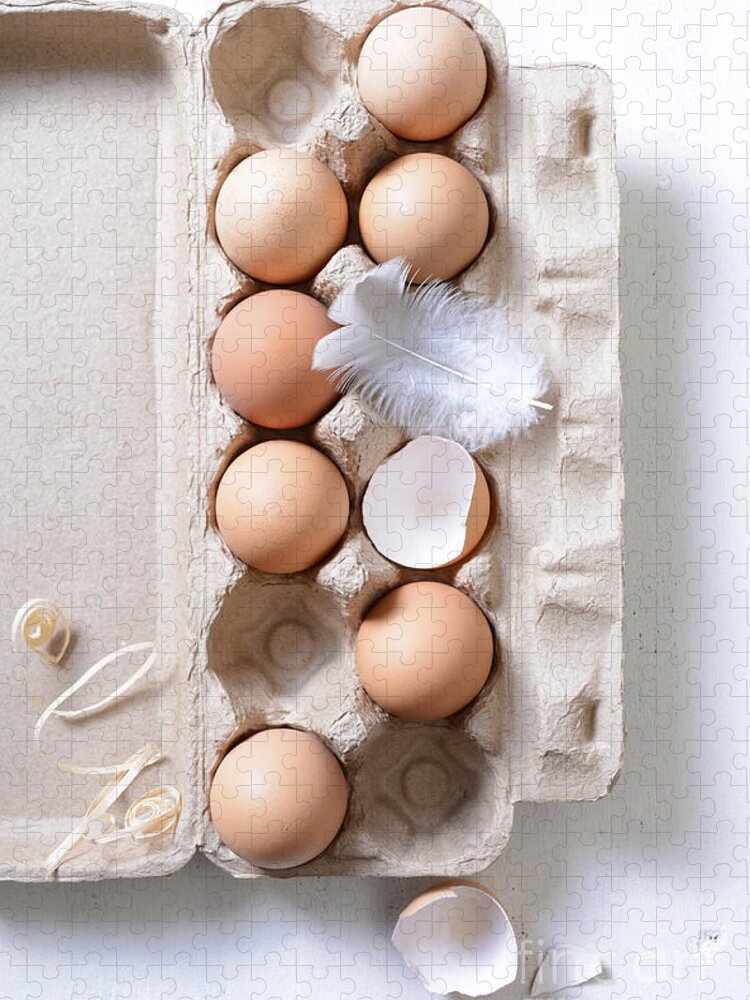 Breakfast Jigsaw Puzzle featuring the photograph Farm fresh eggs in egg carton. by Milleflore Images