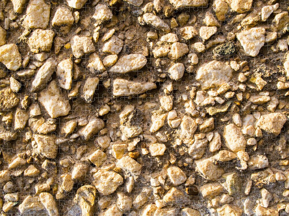 Stone Gravel Jigsaw Puzzle featuring the photograph Gravel stones on a wall by John Williams