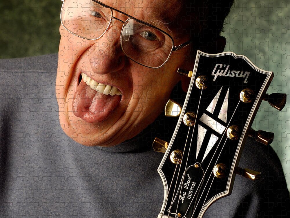 Les Paul Jigsaw Puzzle featuring the photograph Les Paul with tongue out by Gene Martin by David Smith