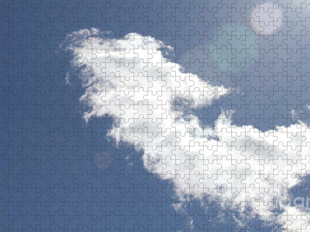 Light In Cloud Jigsaw Puzzle featuring the photograph Light in Cloud Flare by Donna L Munro