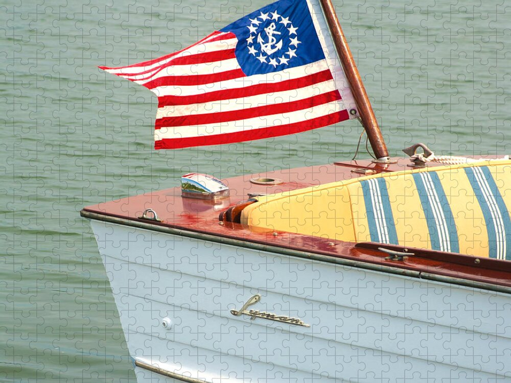 Charles Harden Jigsaw Puzzle featuring the photograph Vintage Mahogany Lyman Runabout Boat with Navy Flag by Charles Harden