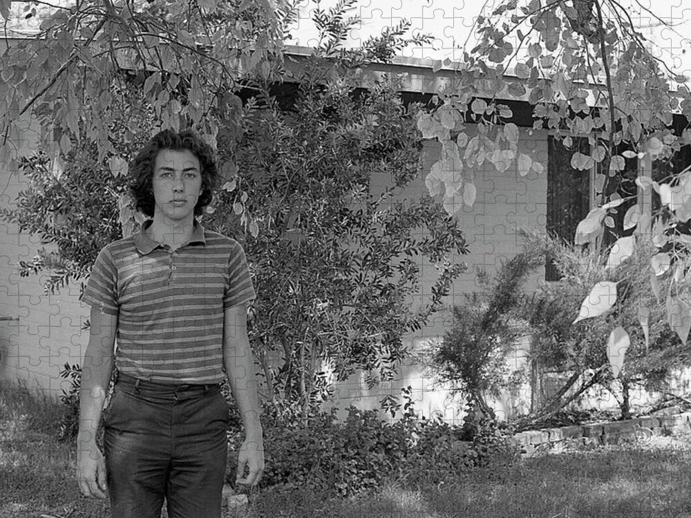 Phoenix Jigsaw Puzzle featuring the photograph Man in Front of Cinder-block Home, 1973 by Jeremy Butler