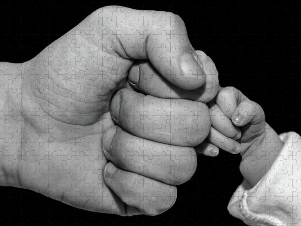 New Born Jigsaw Puzzle featuring the photograph New born fist bump by Joe Holley