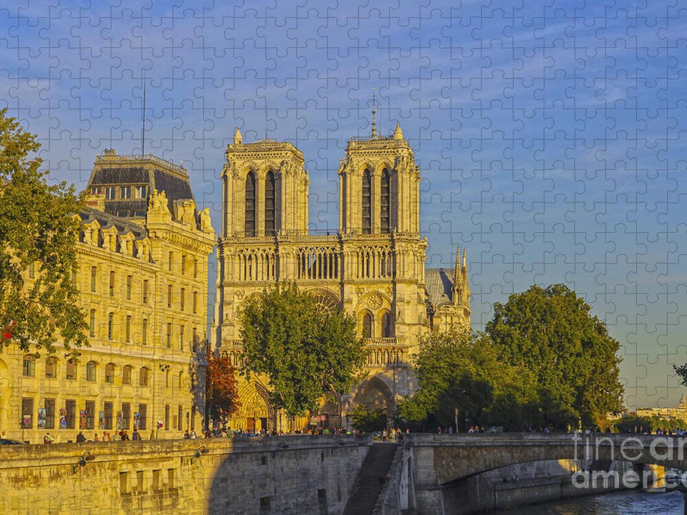 Dame Jigsaw Puzzle featuring the photograph Notre Dame at sunset by Patricia Hofmeester
