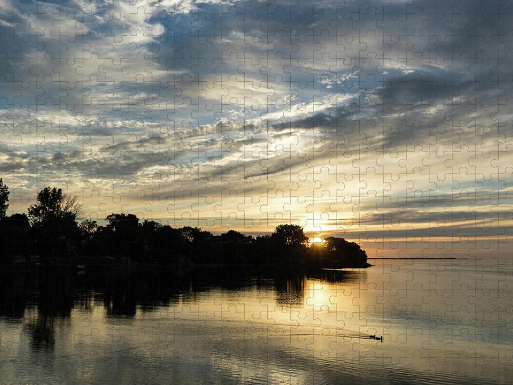 Georgia Mizuleva Jigsaw Puzzle featuring the photograph Pale Gold Sunrays - A Cloudy Sunrise with Two Ducks by Georgia Mizuleva