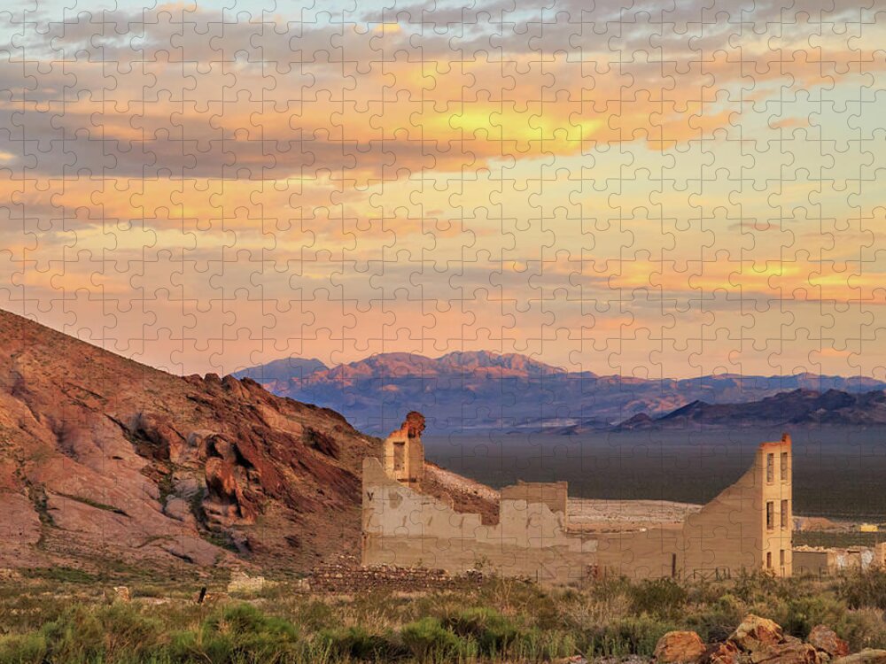 Rhyolite Jigsaw Puzzle featuring the photograph Rhyolite Bank At Sunset by James Eddy