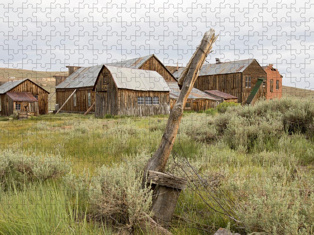 Abandoned Jigsaw Puzzle featuring the photograph Rustic wooden structures in Bodie, California by Karen Foley