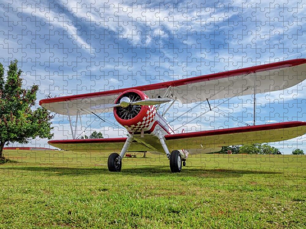 Aviation Jigsaw Puzzle featuring the photograph Stearman on Grass by Chris Buff