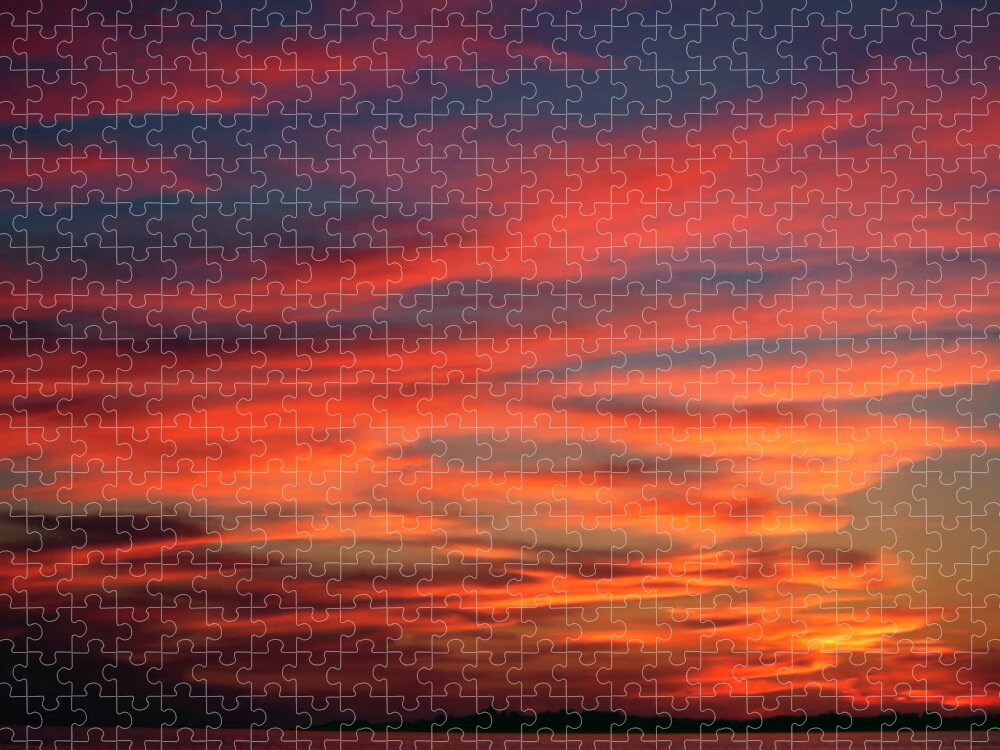 Sunset Over Water Jigsaw Puzzle featuring the photograph Sunset Sky by Sally Weigand