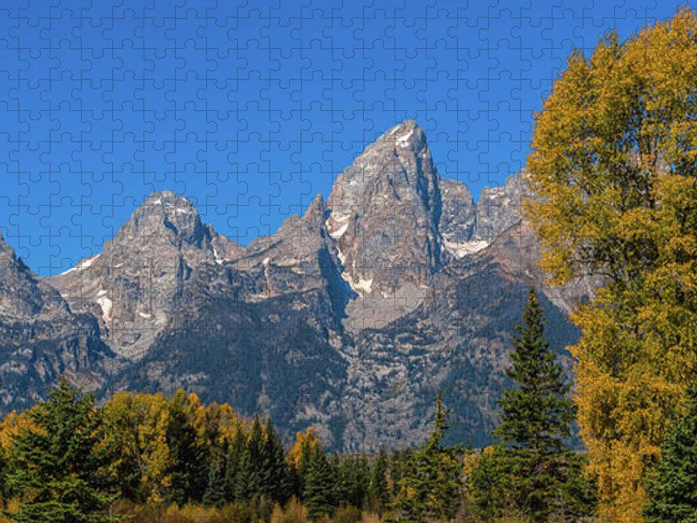 Grand Teton Mountain Range Jigsaw Puzzle featuring the photograph The Grand Teton colors by Yeates Photography