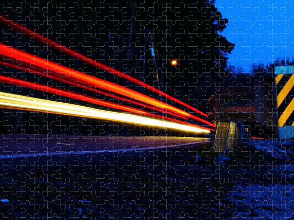 Light Trail Jigsaw Puzzle featuring the photograph The Trail To... by Nicole Lloyd