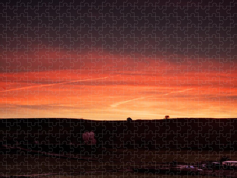 Red Jigsaw Puzzle featuring the photograph Two trees and a red sunset by Weston Westmoreland
