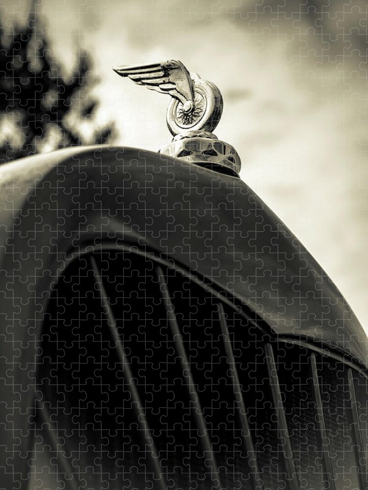 Hood Ornament Jigsaw Puzzle featuring the photograph Winged Wheel by Caitlyn Grasso
