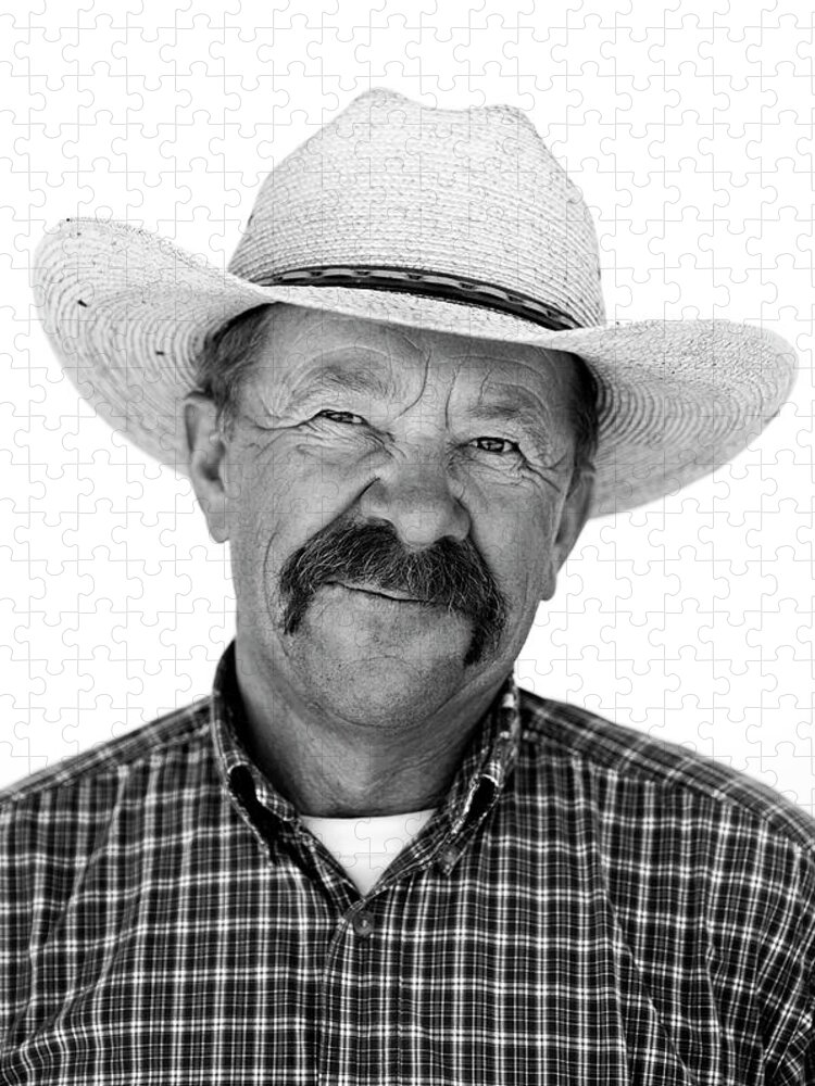 Mature Adult Jigsaw Puzzle featuring the photograph A Black And White Portrait Of A Cowboy #1 by Rachid Dahnoun
