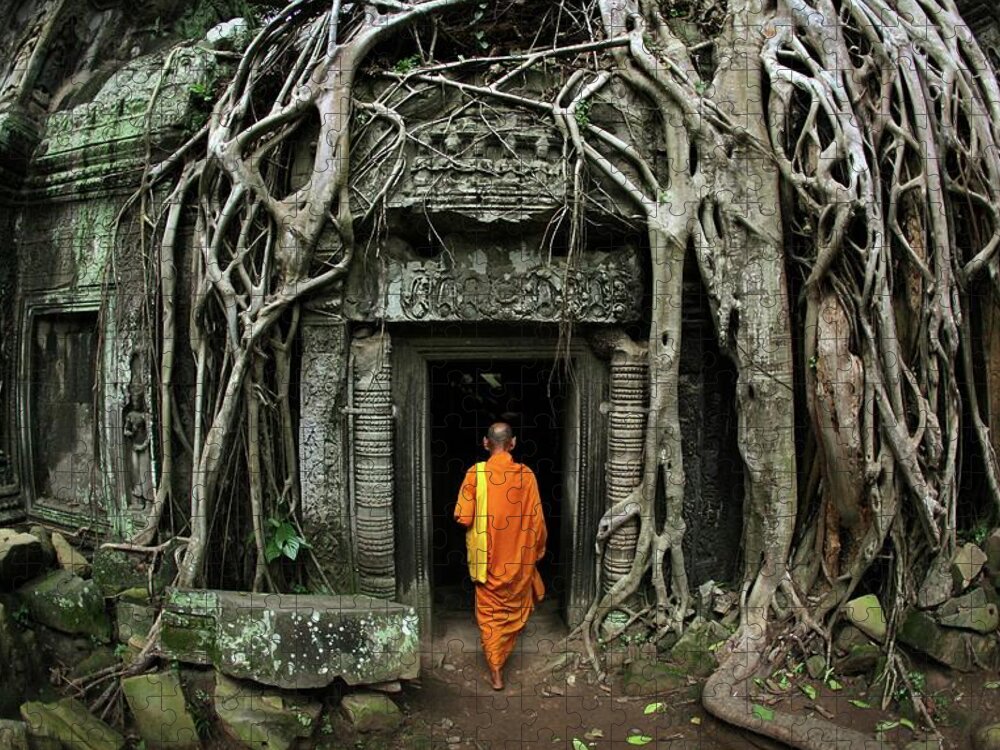 Orange Color Jigsaw Puzzle featuring the photograph Buddhist Monk At Angkor Wat Temple #1 by Timothy Allen