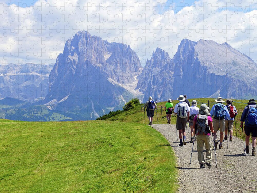 Italy Jigsaw Puzzle featuring the photograph Hikers walking towards the Langkofel #1 by Steve Estvanik