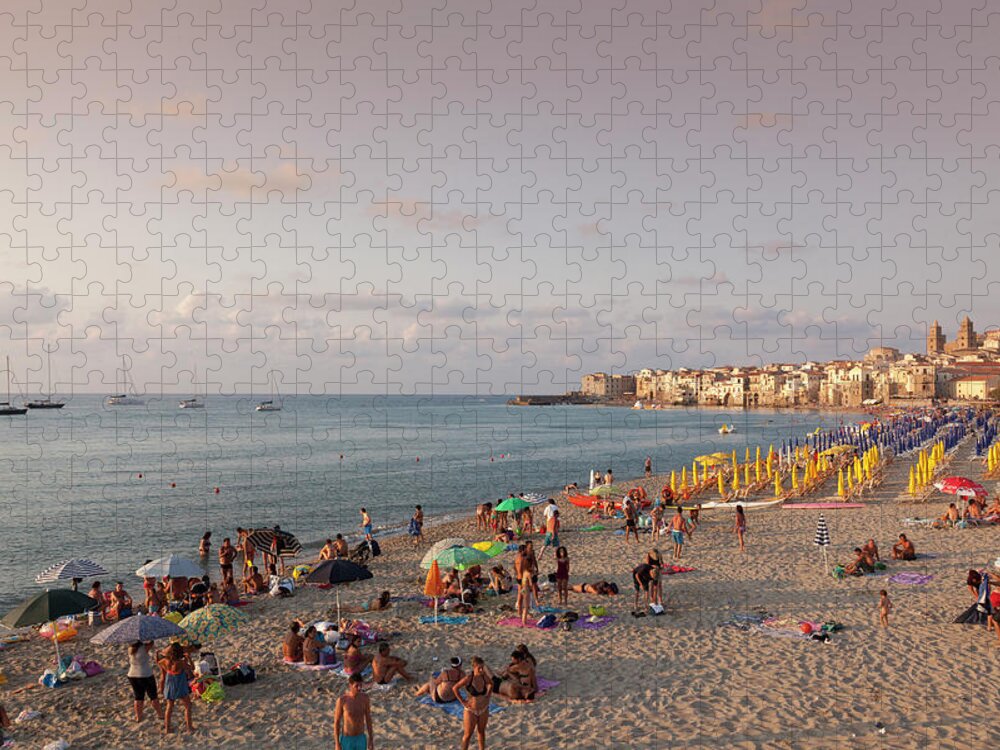 Water's Edge Jigsaw Puzzle featuring the photograph Italy, Sicily. Cefalu. Bathers On The #1 by Buena Vista Images