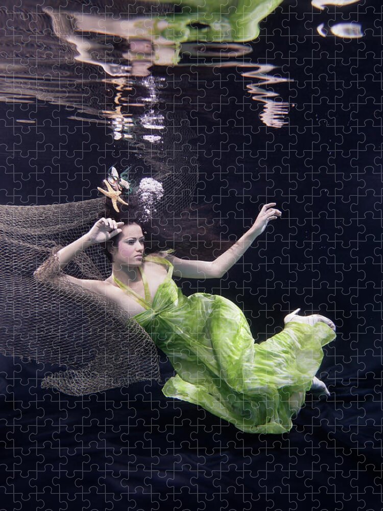 Tranquility Jigsaw Puzzle featuring the photograph Mixed Race Woman In Dress Swimming #1 by Ming H2 Wu