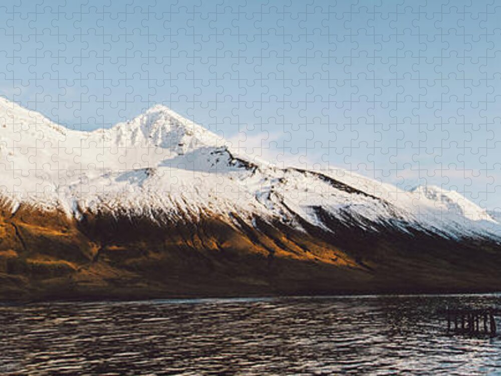 Adventure Jigsaw Puzzle featuring the photograph Beautiful scene of a landscape with high snowy mountains and sea. #4 by Joaquin Corbalan