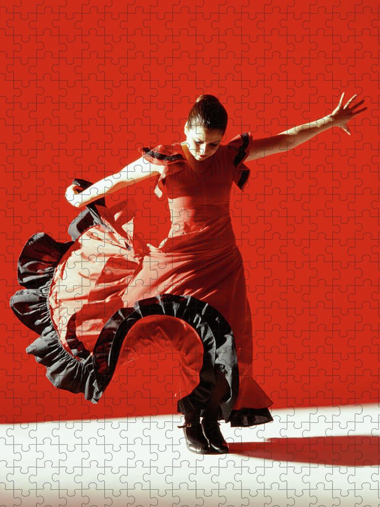 Ballet Dancer Jigsaw Puzzle featuring the photograph A Female Flamenco Dancer Performing A by George Doyle