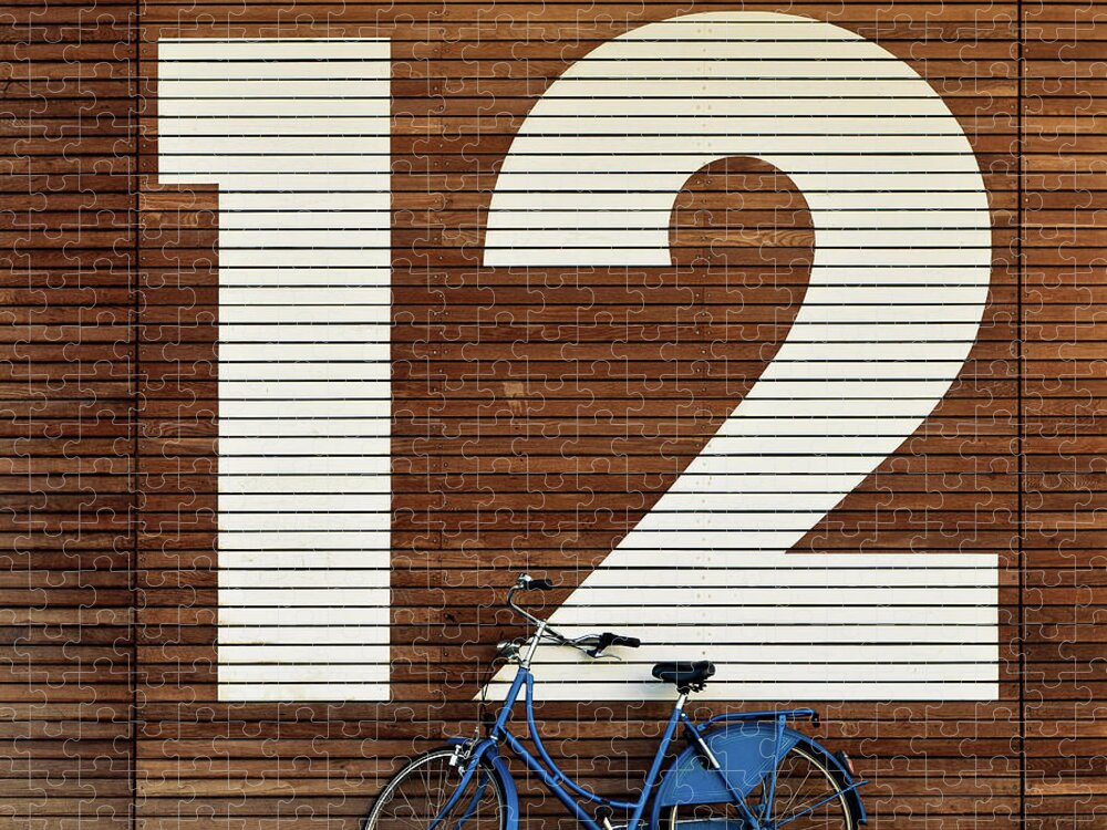 Leaning Jigsaw Puzzle featuring the photograph Bike Against Big 12 by Sebastian Steiner