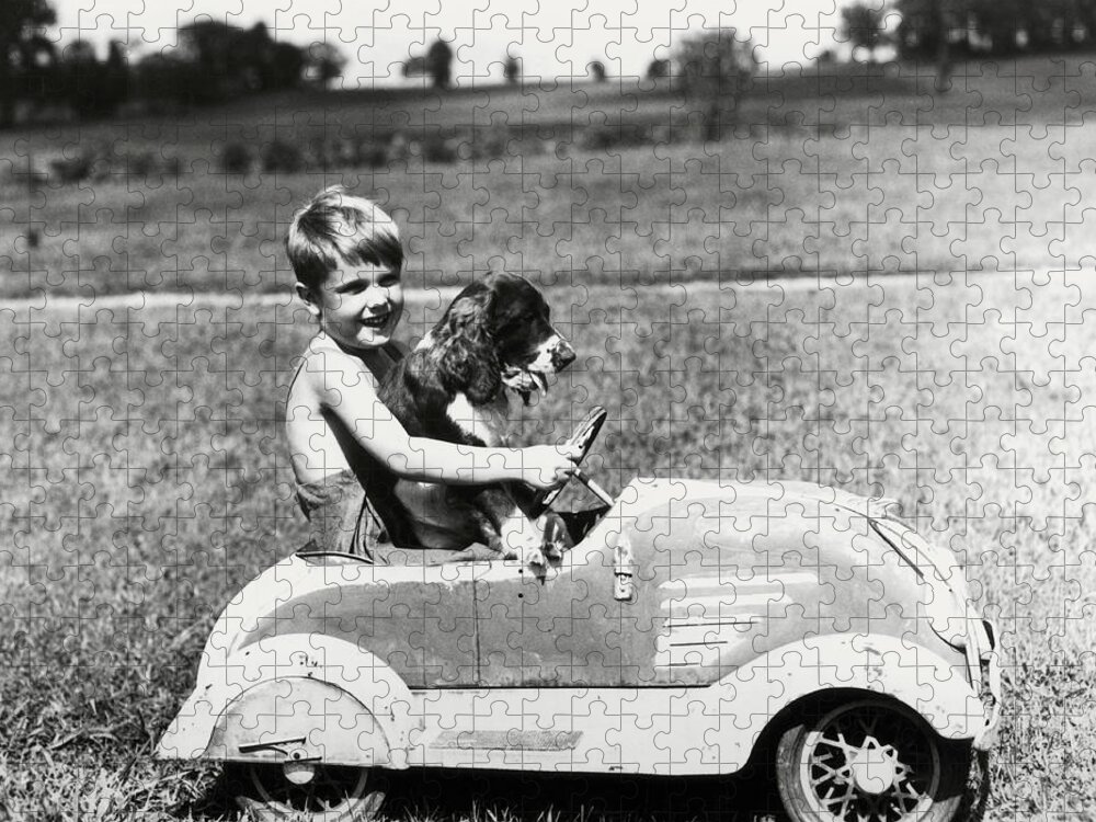 Aerodynamic Jigsaw Puzzle featuring the photograph Boy Driving Toy Car, With Springer by H. Armstrong Roberts