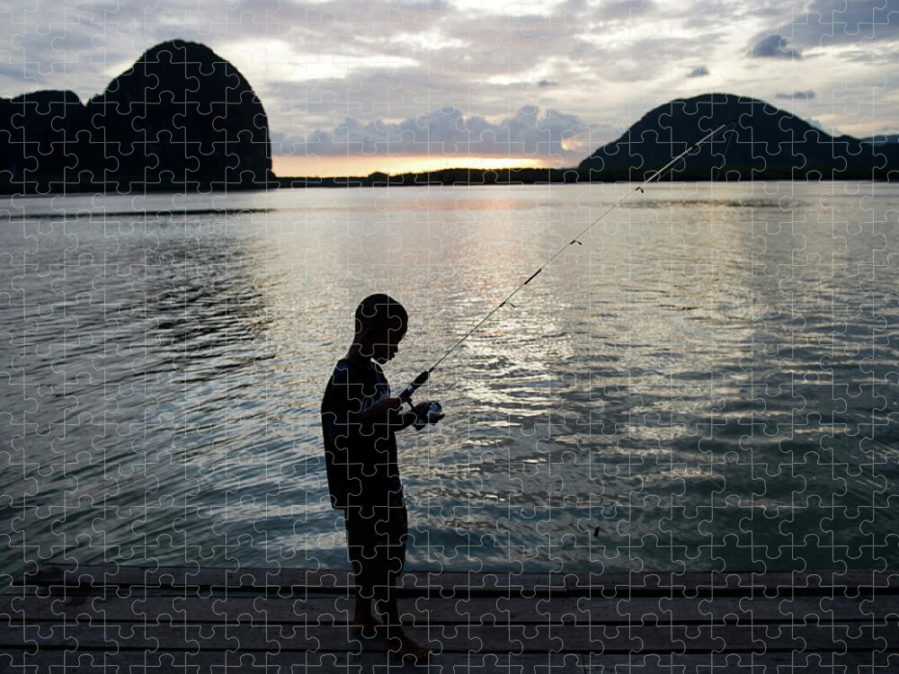 Boy Fishing On Pier Jigsaw Puzzle by Kampee Patisena 