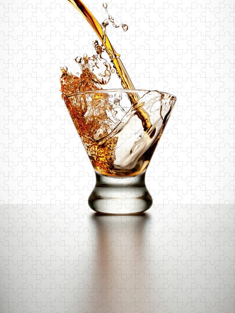 White Background Jigsaw Puzzle featuring the photograph Brown Liquor Splashing Into A Glass by Chris Stein