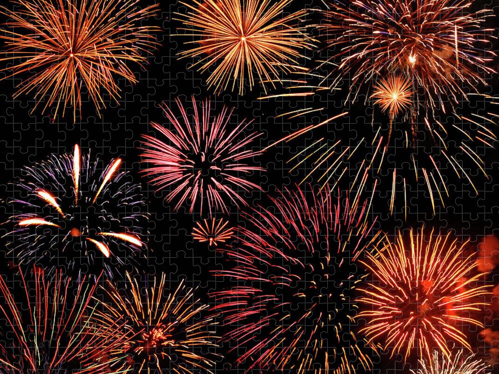Firework Display Jigsaw Puzzle featuring the photograph Bursts Of Fireworks by © 2011 Dorann Weber