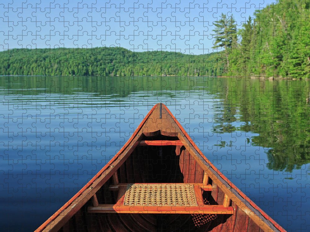 Extreme Terrain Jigsaw Puzzle featuring the photograph Canoe In The Morning Sun by Huntimages