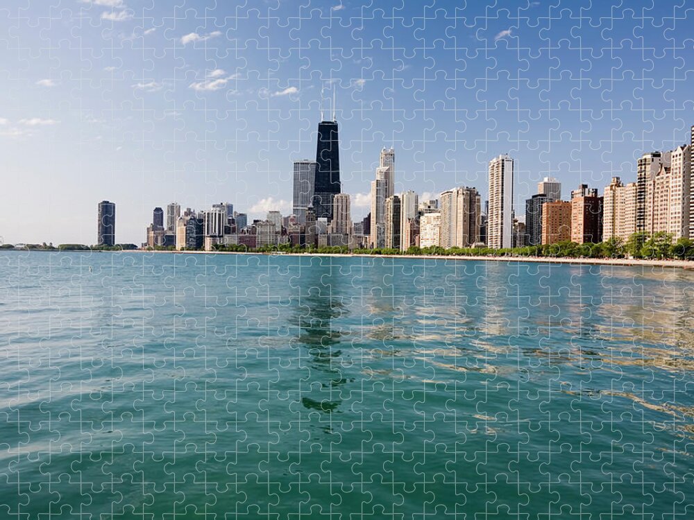 Lake Michigan Jigsaw Puzzle featuring the photograph Chicago Skyline From The Lake by Stevegeer