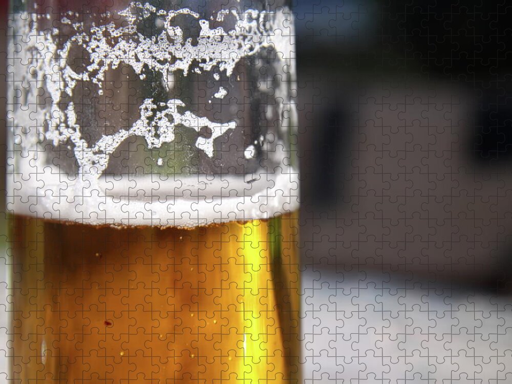 Alcohol Jigsaw Puzzle featuring the photograph Close Up Of A Glass Of Lager by Jodie Wallis