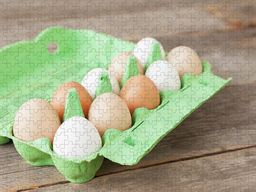 Environmental Conservation Jigsaw Puzzle featuring the photograph Close Up Of Carton Of Mixed Eggs by Stefanie Grewel