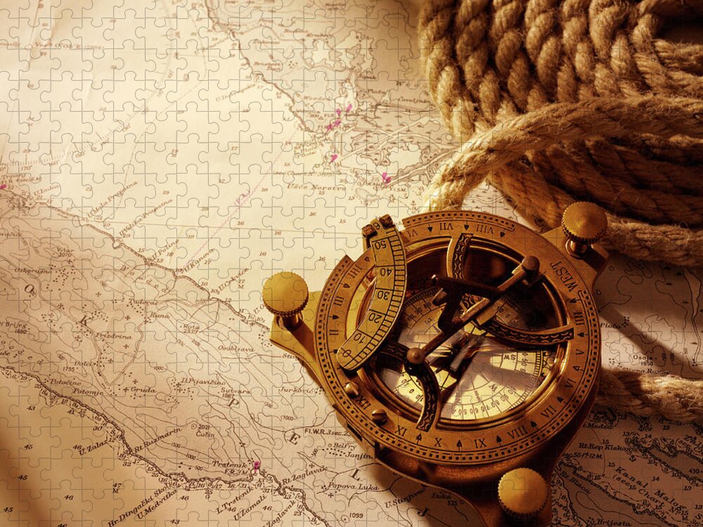 Rope Jigsaw Puzzle featuring the photograph Coiled Rope And Nautical Chart With A by Wragg