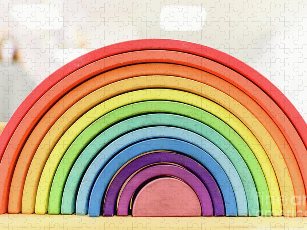 Arrangement Jigsaw Puzzle featuring the photograph Colorful Waldorf wooden rainbow in a montessori teaching pedagogy classroom. by Joaquin Corbalan