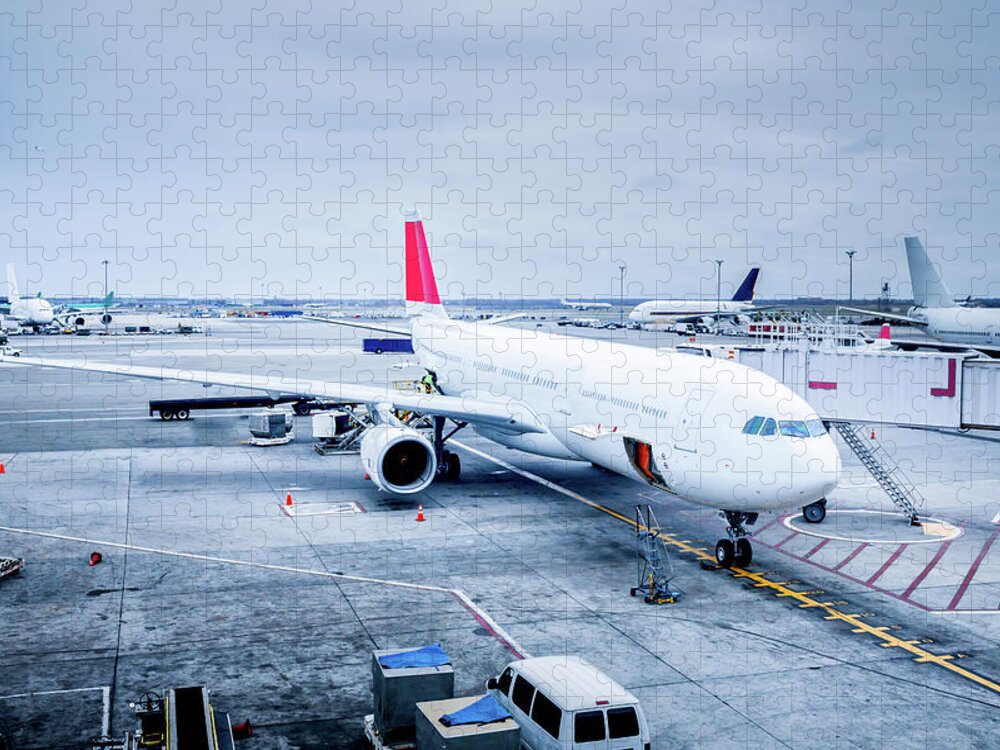 Airport Departure Area Jigsaw Puzzle featuring the photograph Commercial Jet At Gate by Grandriver