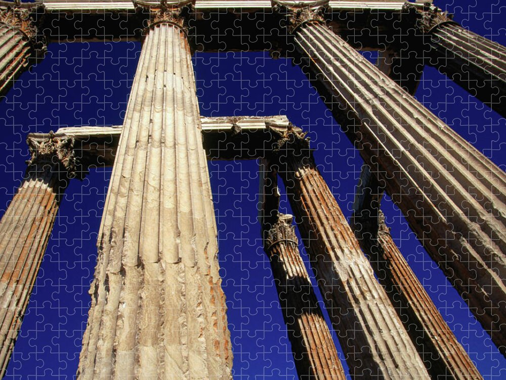 Greek Culture Jigsaw Puzzle featuring the photograph Corinthian Columns Of The Temple Of by Lonely Planet
