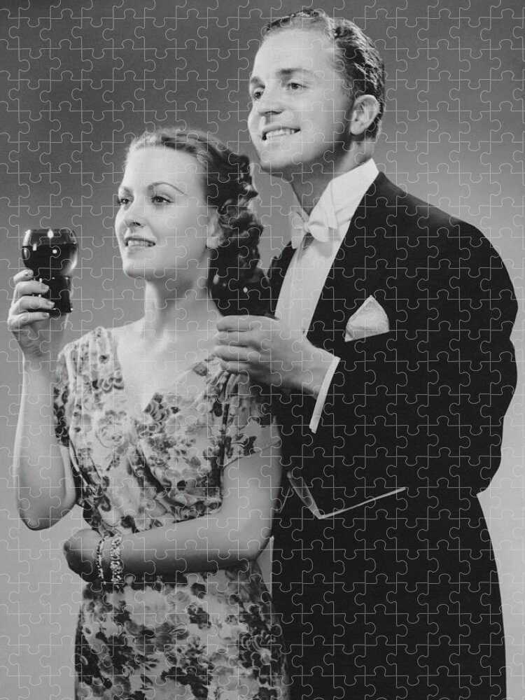 Heterosexual Couple Jigsaw Puzzle featuring the photograph Couple Dressed Up Holding Drinks by George Marks