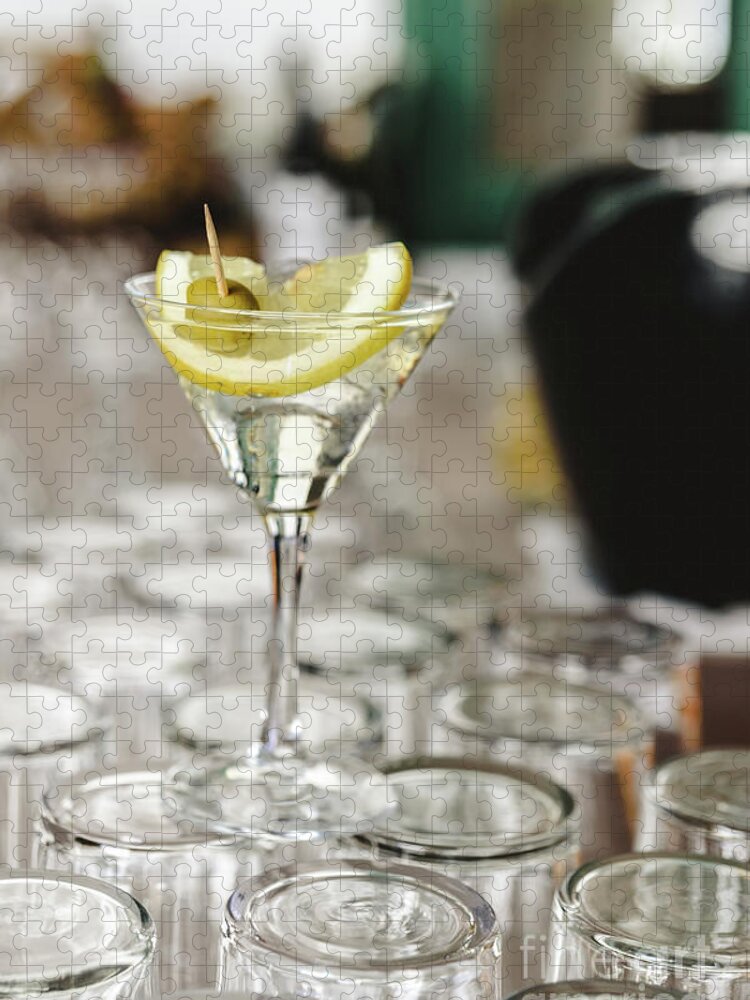 Alcohol Jigsaw Puzzle featuring the photograph Cup of gin and tonic, with a slice of lemon and olive. by Joaquin Corbalan