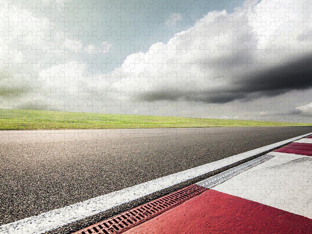 Tranquility Jigsaw Puzzle featuring the photograph Empty Motor Racing Track by Yubo