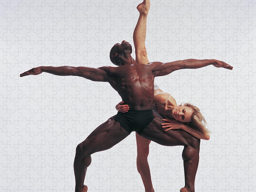 Expertise Jigsaw Puzzle featuring the photograph Female Dancer Standing On One Leg by Chris Nash