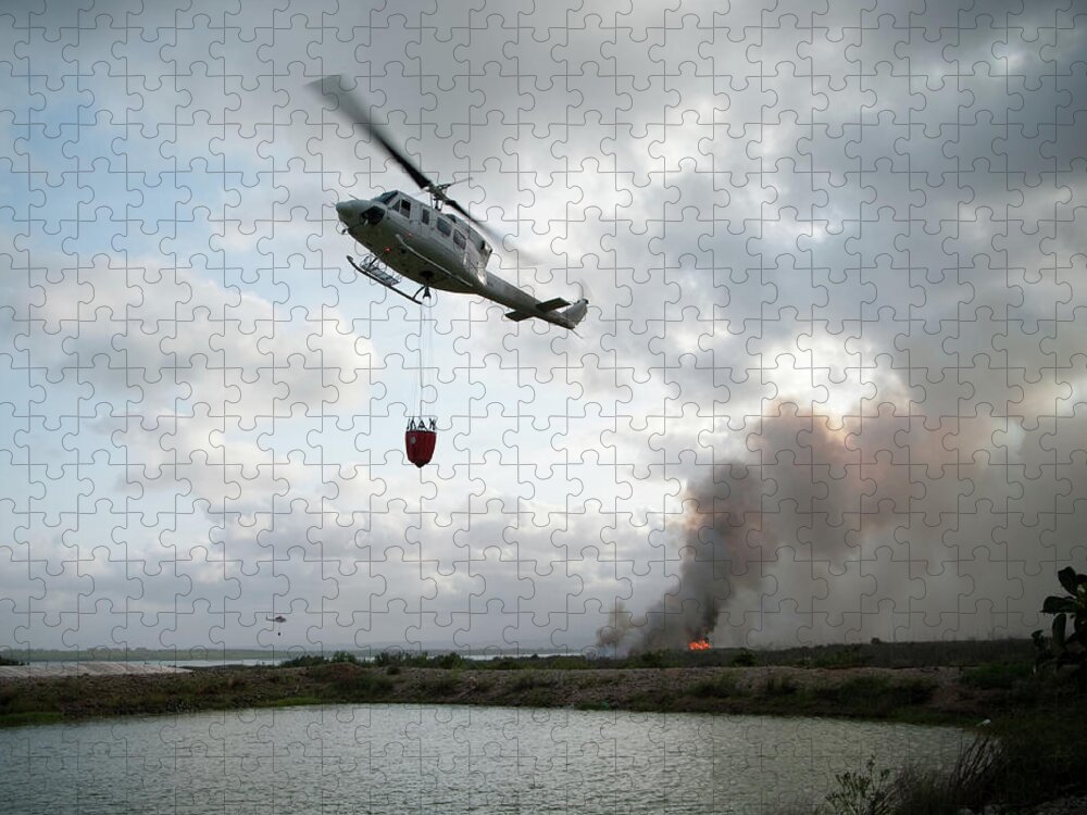 Reservoir Jigsaw Puzzle featuring the photograph Fire Fighting Helicopter Approaches by Gavind