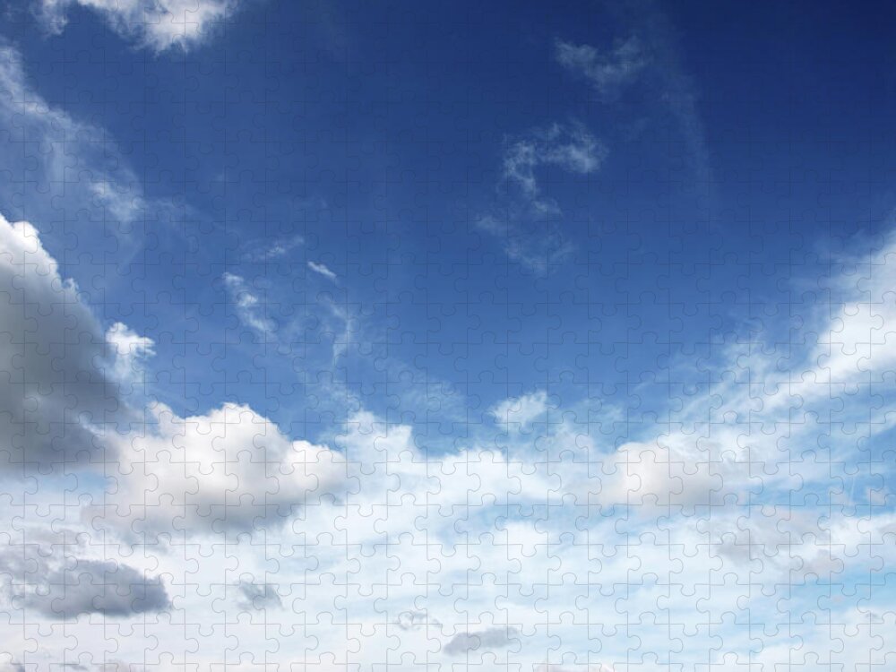 Outdoors Jigsaw Puzzle featuring the photograph Fluffy Clouds by Richard Newstead