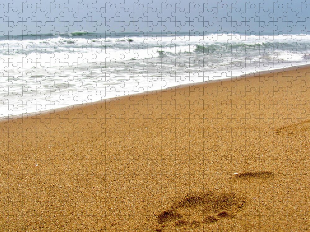 Tranquility Jigsaw Puzzle featuring the photograph Footprint On Sandy Beach With The Waves by Amlan Mathur