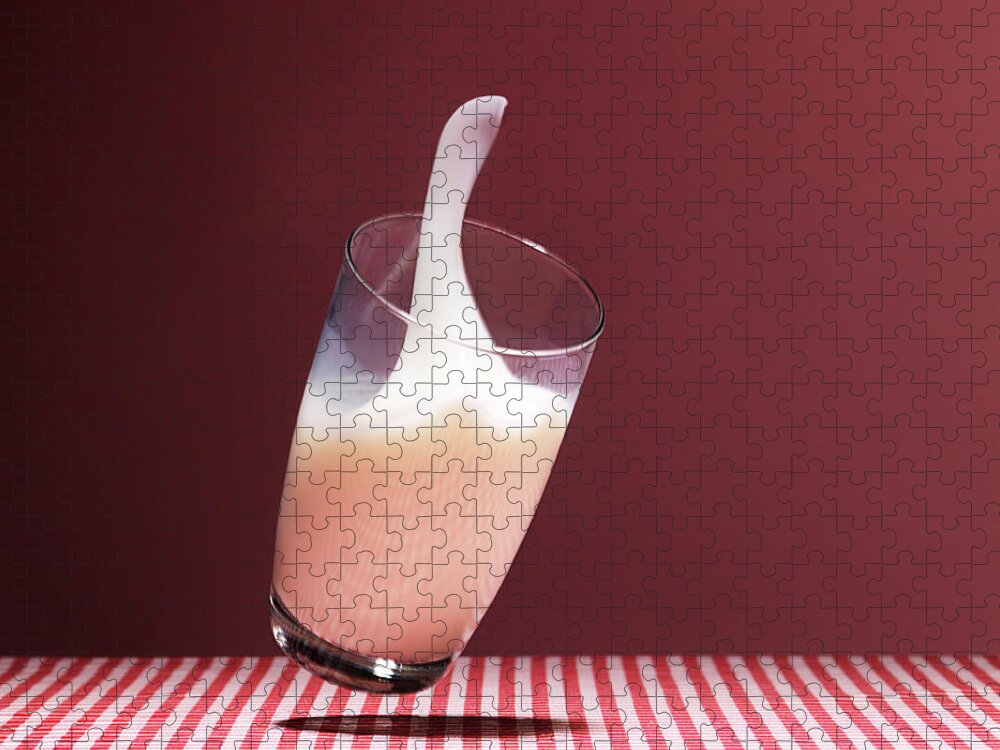 Milk Jigsaw Puzzle featuring the photograph Glass Of Milk Falling On Table by Henrik Sorensen