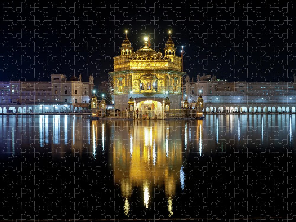 Indian Subcontinent Ethnicity Jigsaw Puzzle featuring the photograph Golden Temple At Night In Amritsar by Yoav Peled