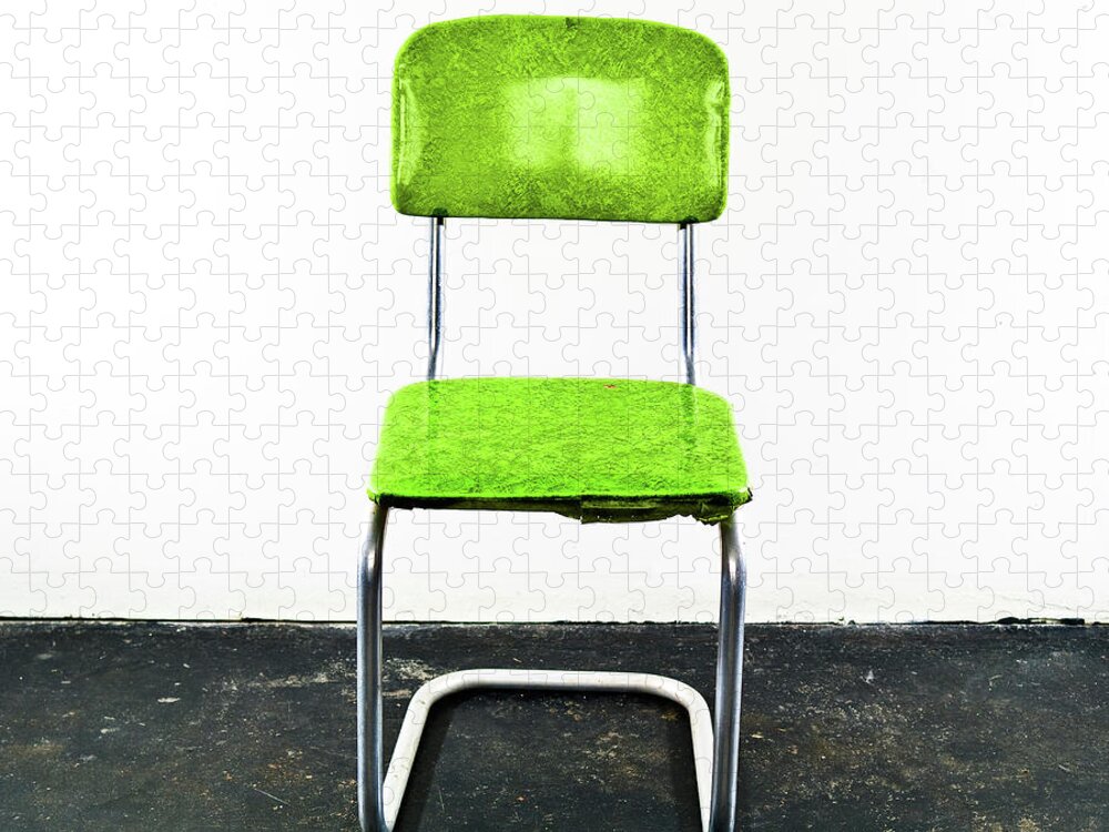 Single Object Jigsaw Puzzle featuring the photograph Green Chair On A Black Floor by Jay B Sauceda