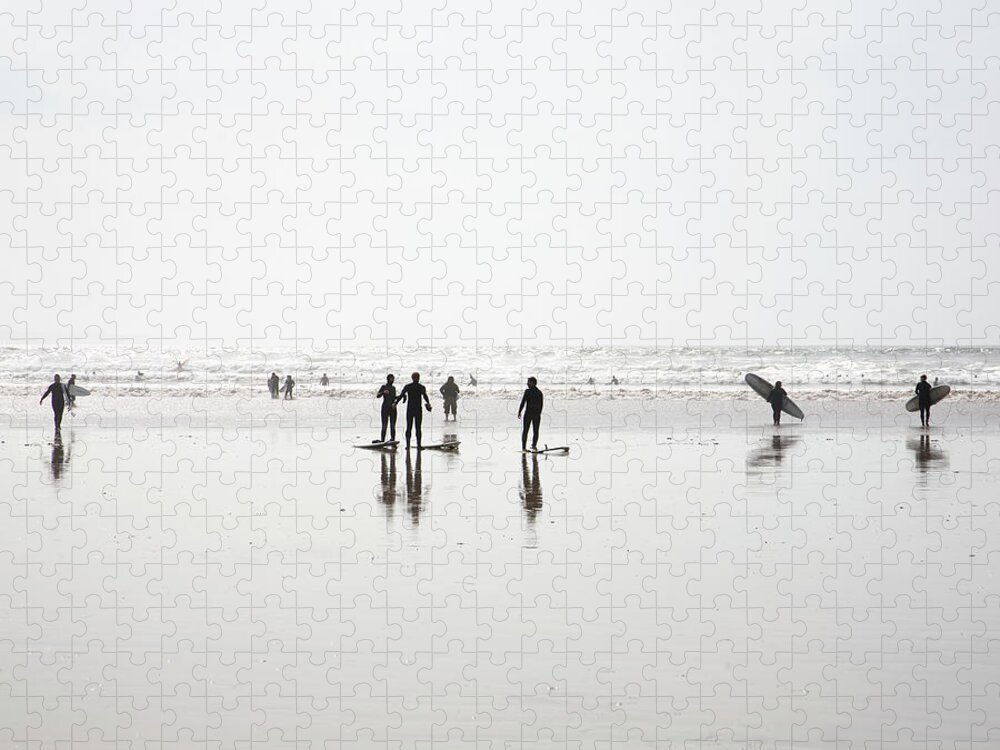 Part Of A Series Jigsaw Puzzle featuring the photograph Group Of Surfers Walking On Beach by Ashley Jouhar